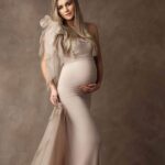 Glamour dress with long tulle train and loop on shoulder